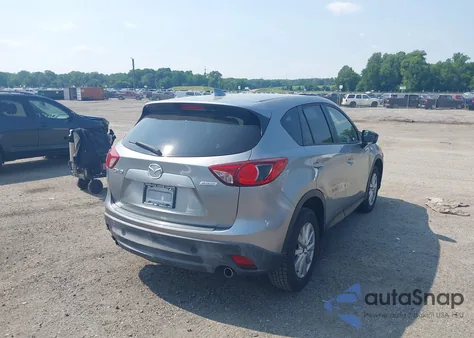 2014 Mazda Cx-5 Touring z USA, uszkodzony, nr VIN JM3KE2CY1E0425278